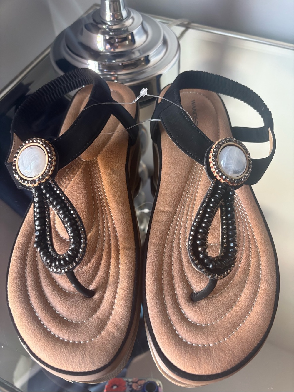 Wanderlust Black Beaded T-Strap Sandals with Decorative Medallions
